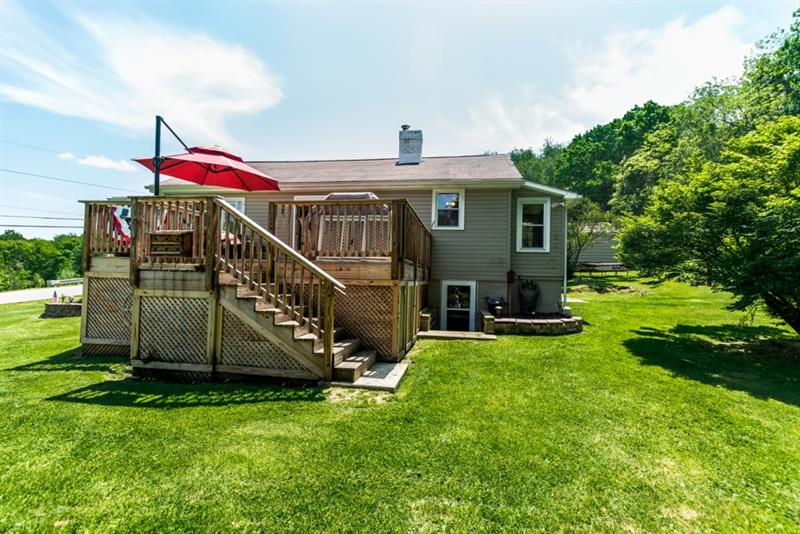 1599 Pine Run Road Rochester, PA 15074 - Photo 3 of 13 Large side deck off of dining area for relaxation or entertaining!