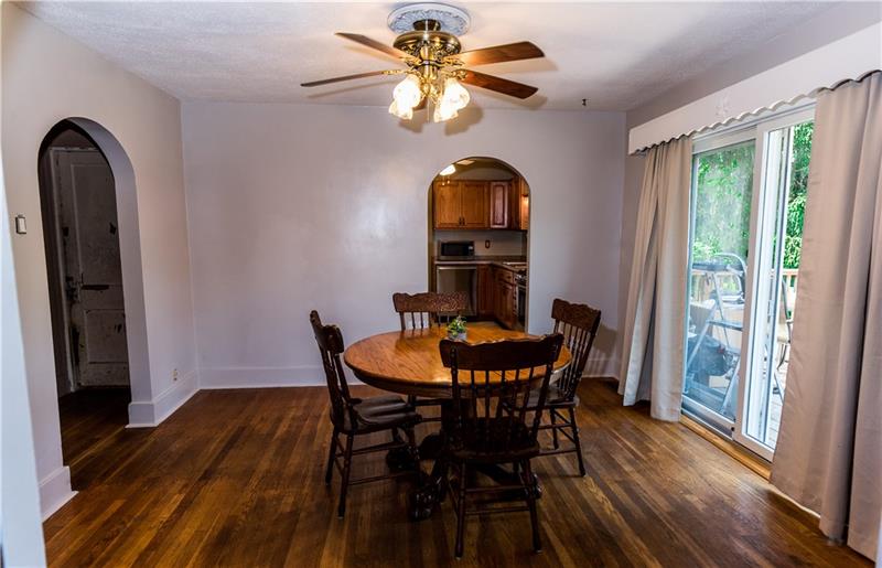 1599 Pine Run Road Rochester, PA 15074 - Photo 10 of 13 Nice hardwood in the dining area with access to the deck through the sliding glass doors