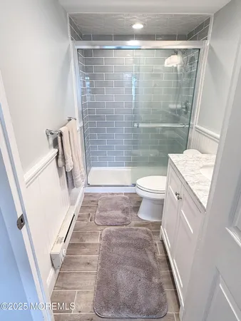 a bathroom with a sink and a shower
