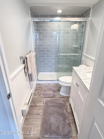 a bathroom with a sink and a shower
