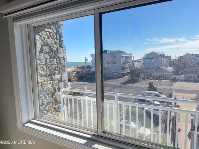 a view of a chair and table in a room