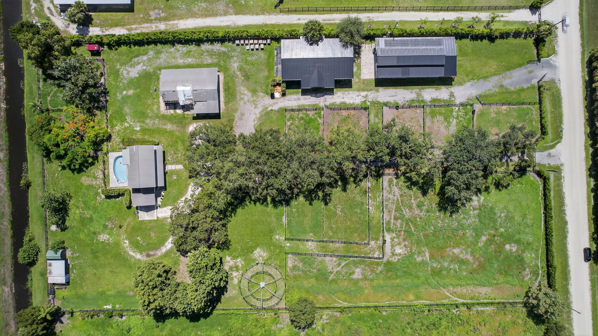 16229 Rustic Road Wellington, FL 33470 - Photo 117 of 140 an aerial view of a house with a yard
