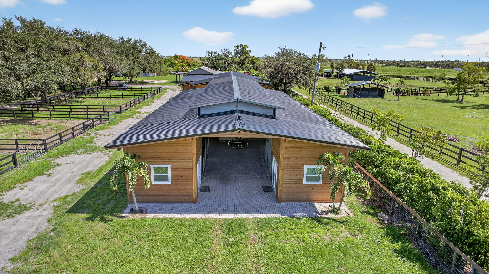 16229 Rustic Road Wellington, FL 33470 - Photo 119 of 140 a aerial view of a house with a yard