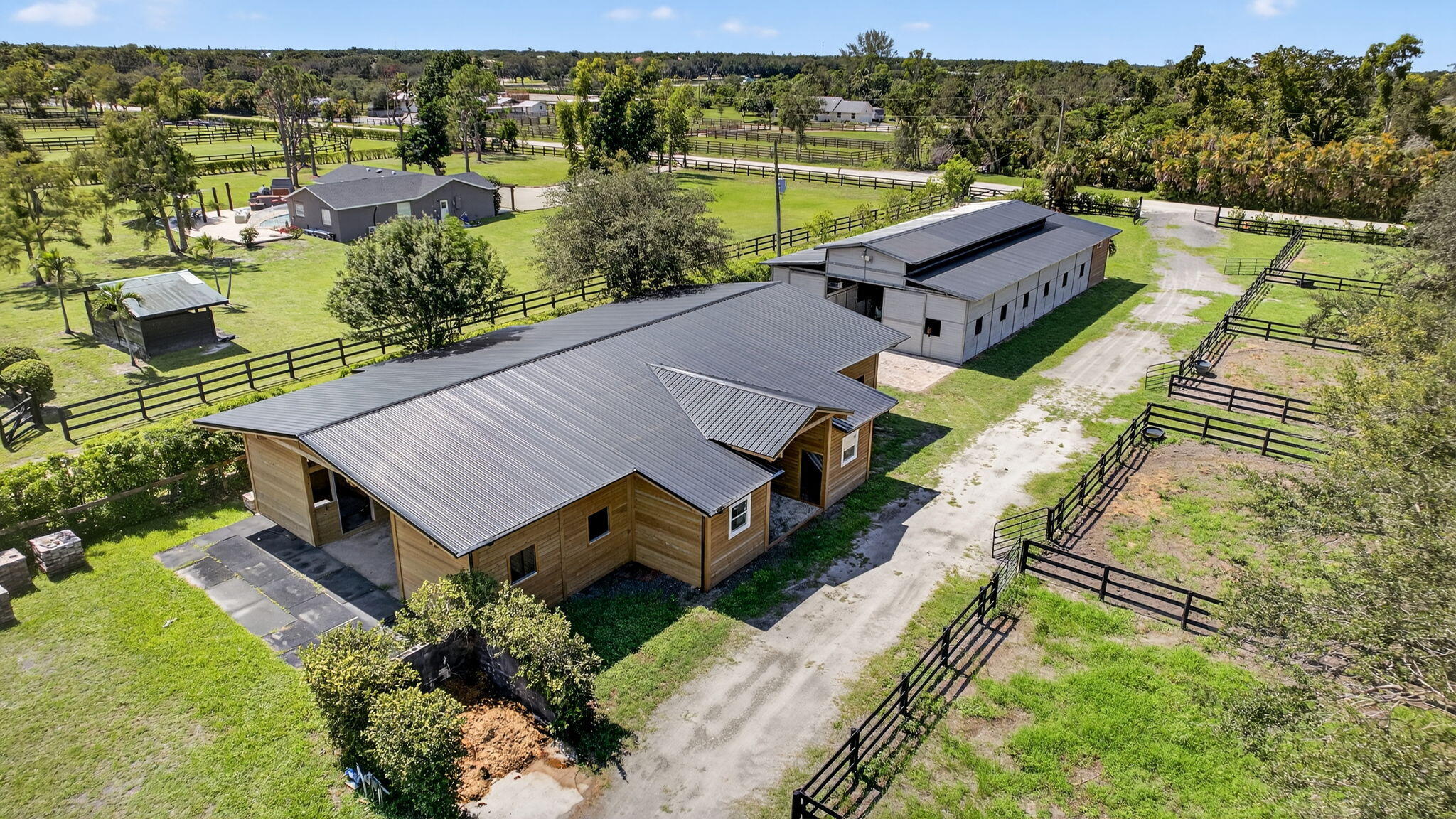 16229 Rustic Road Wellington, FL 33470 - Photo 128 of 140 an aerial view of a house with big yard