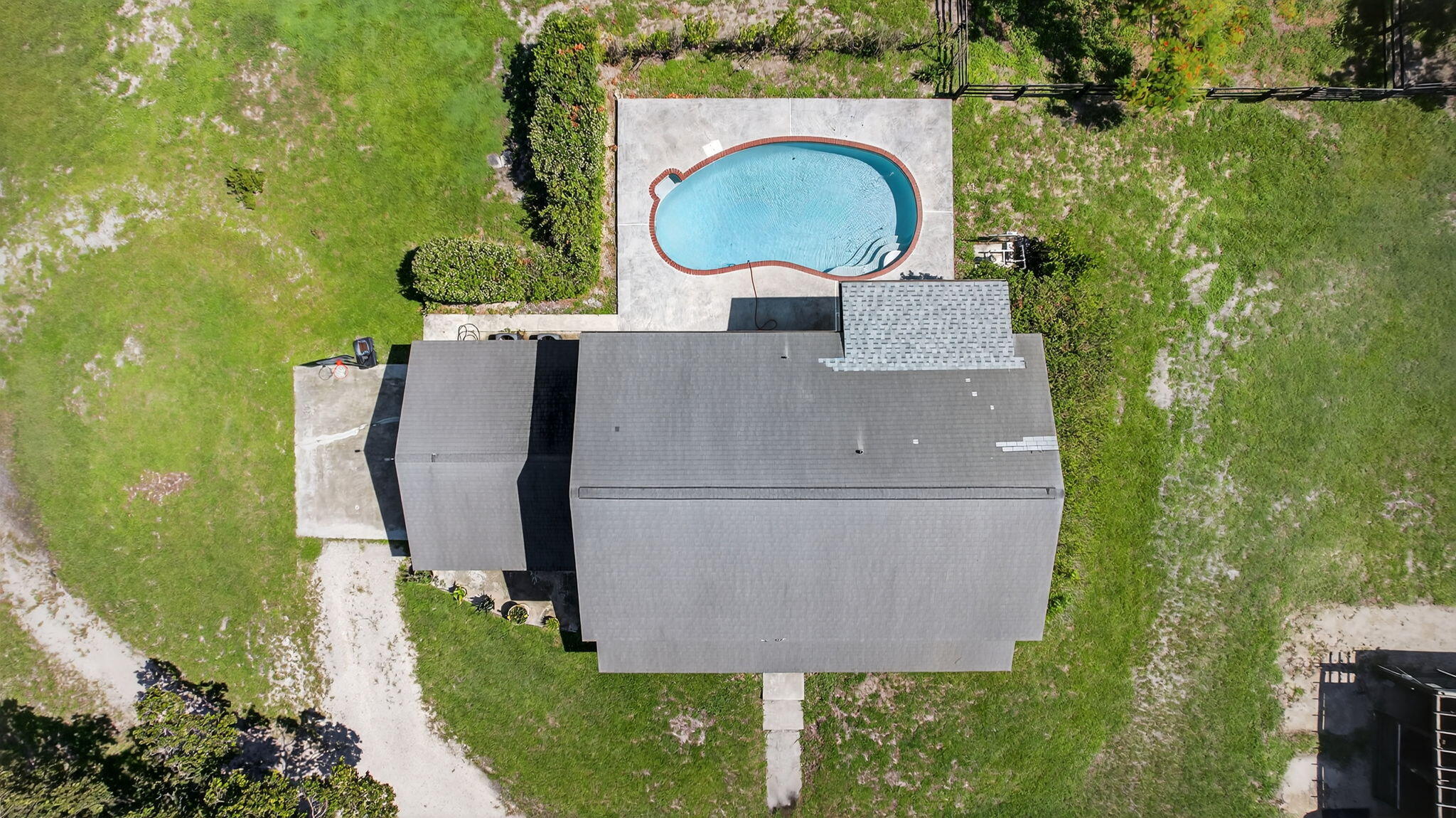 16229 Rustic Road Wellington, FL 33470 - Photo 131 of 140 an aerial view of a house with outdoor space and a fountain