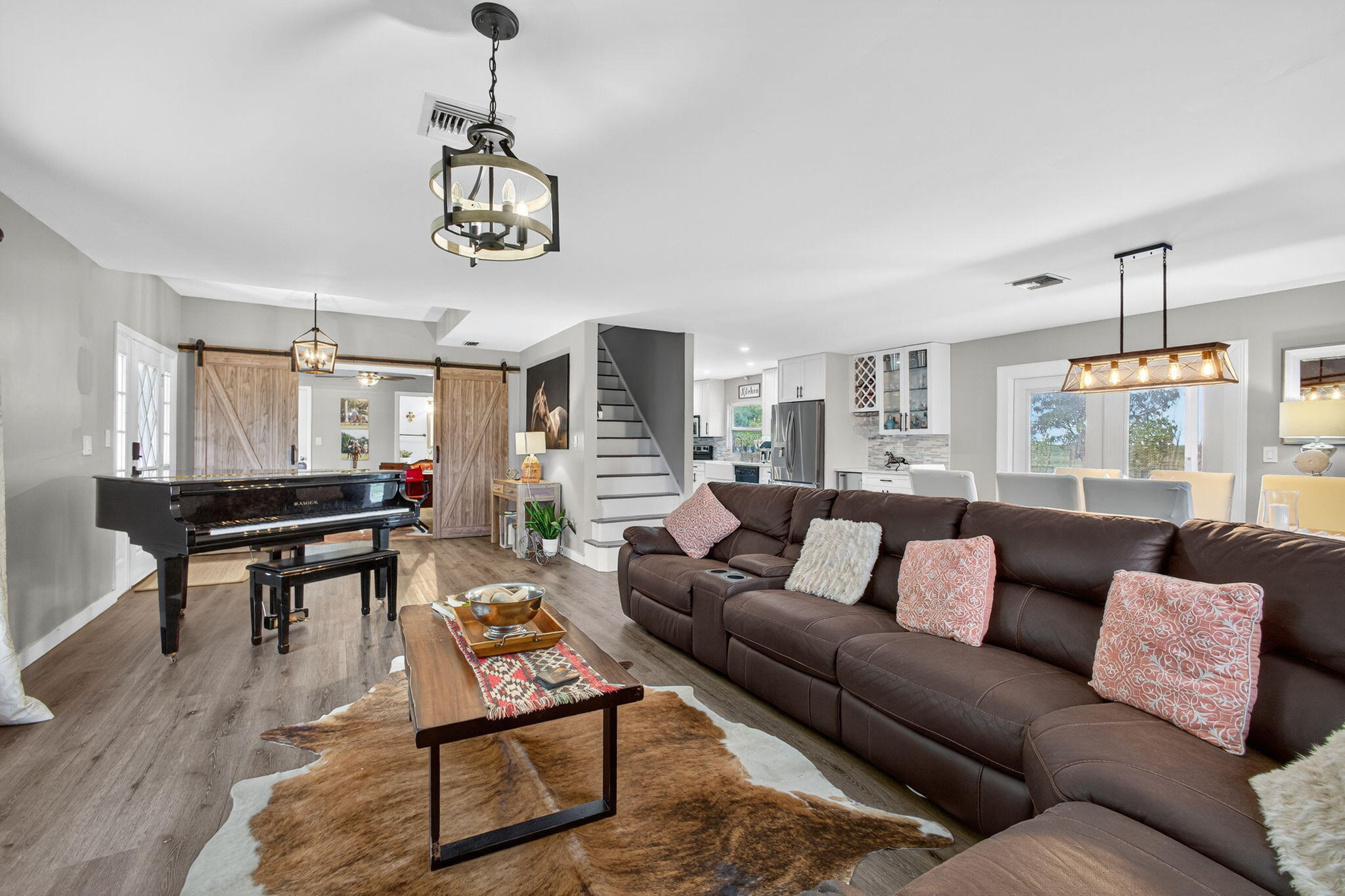 16229 Rustic Road Wellington, FL 33470 - Photo 20 of 140 a living room with furniture and a wooden floor