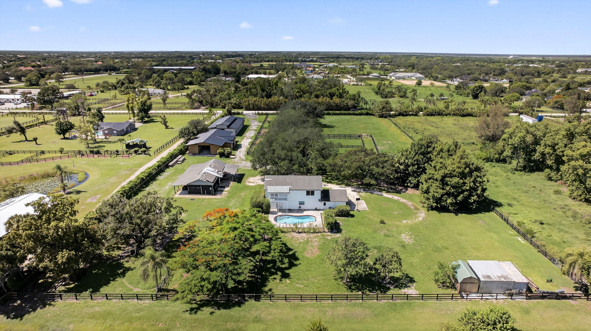 16229 Rustic Road Wellington, FL 33470 - Photo 3 of 140 131-web-or-mls-DJI_0154