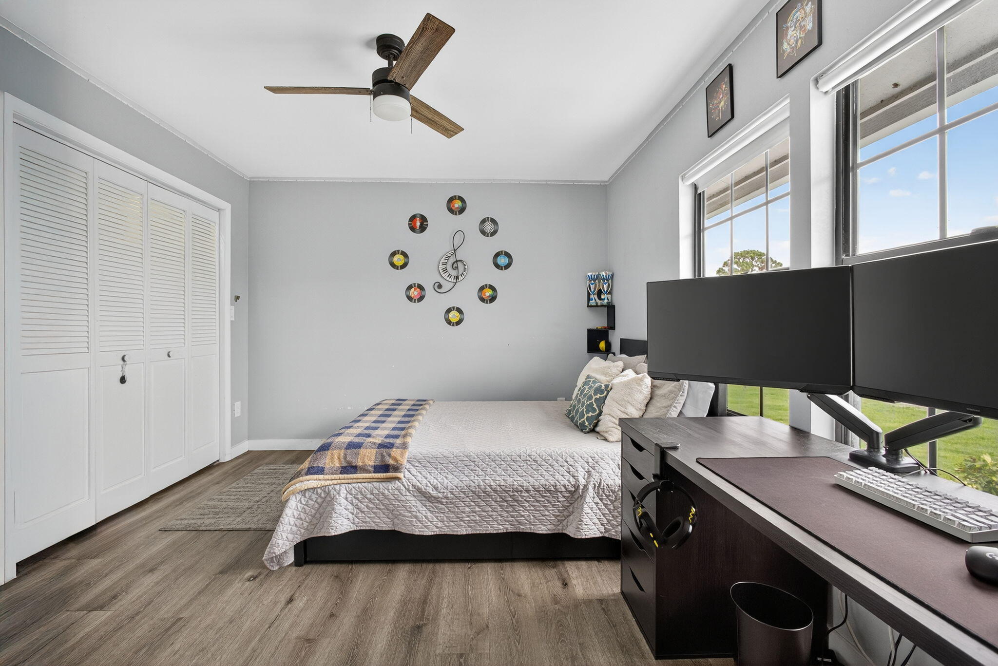 16229 Rustic Road Wellington, FL 33470 - Photo 40 of 140 a bedroom with a bed and a window