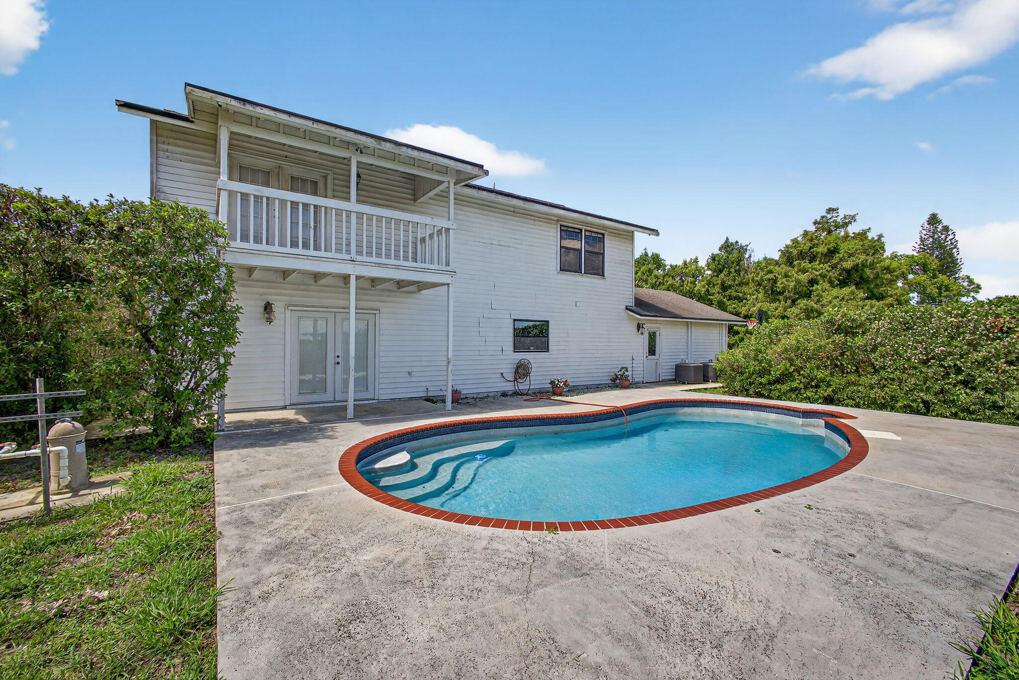 16229 Rustic Road Wellington, FL 33470 - Photo 68 of 140 a view of outdoor space yard swimming pool and patio