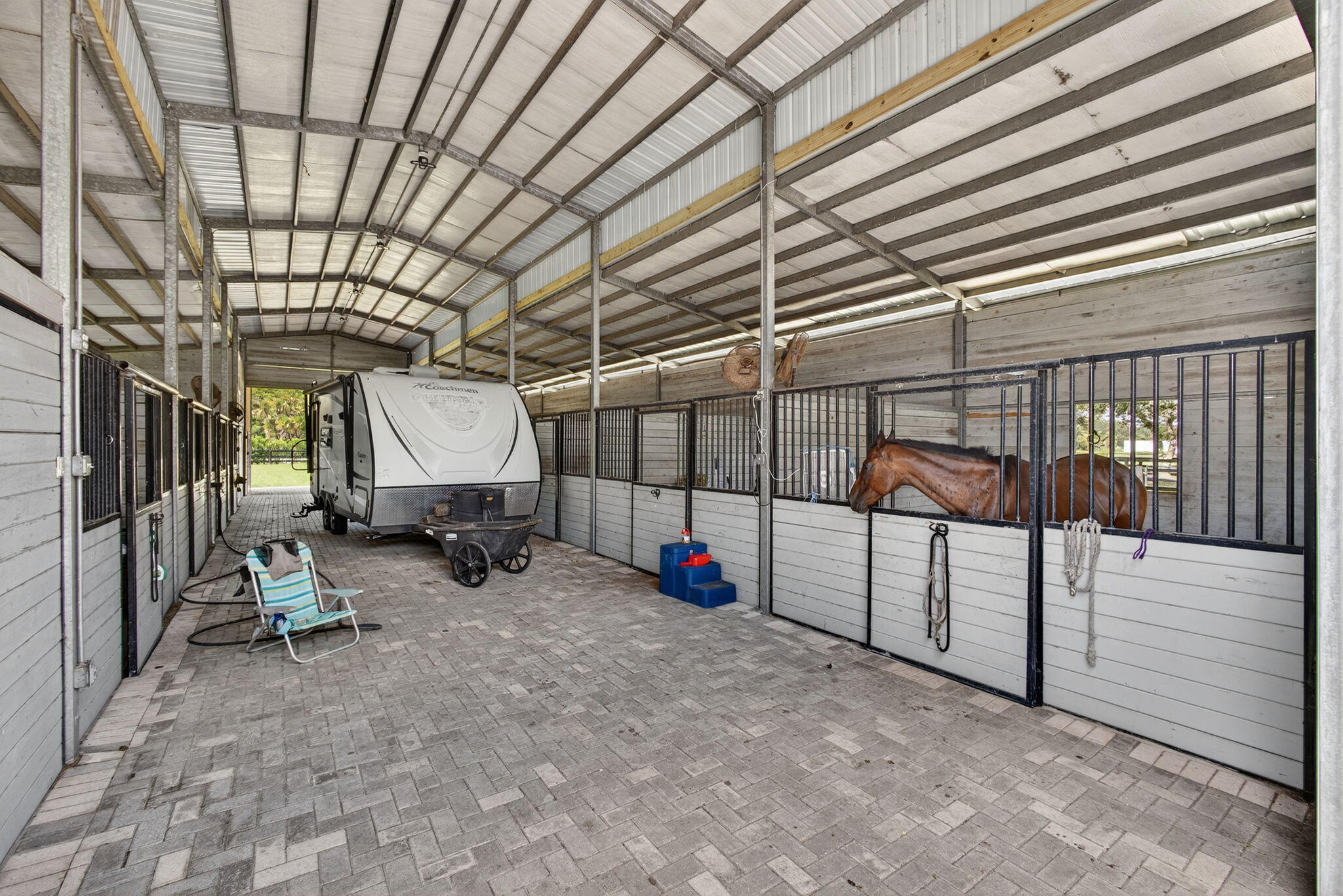 16229 Rustic Road Wellington, FL 33470 - Photo 95 of 140 a view of storage and utility room