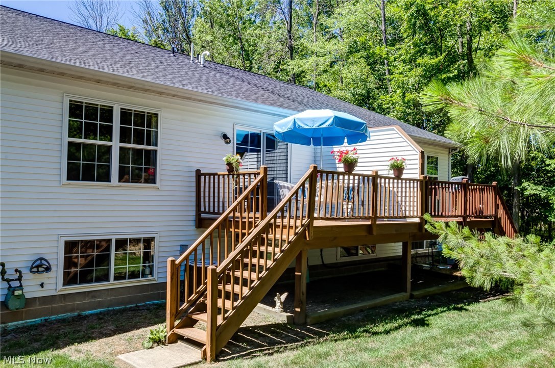 8433 Hendricks Road Mentor, OH 44060 - Photo 29 of 31 The deck is great for entertaining or a private coffee break. It is private and faces the common wooded area.