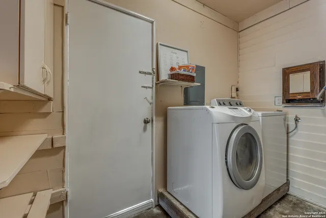 a utility room with dryer and washer