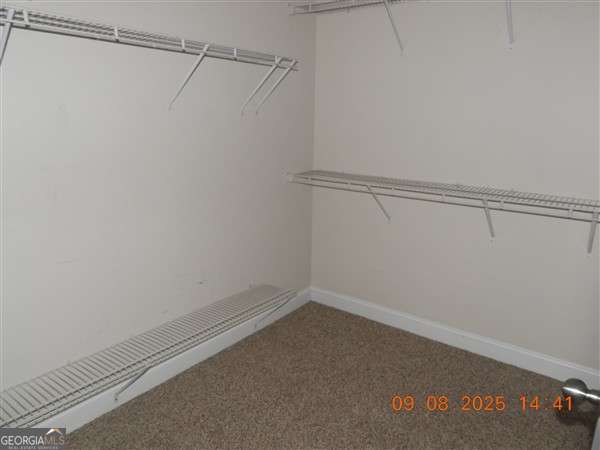 222 Prospect Loop Midway, GA 31320 - Photo 13 of 15 a view of a room with racks on the wall