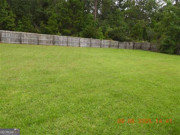 222 Prospect Loop Midway, GA 31320 - Photo 15 of 15 a view of a back yard