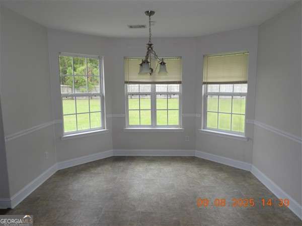 222 Prospect Loop Midway, GA 31320 - Photo 6 of 15 a view of room with window and ceiling fan