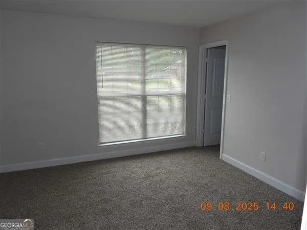 an empty room with a window