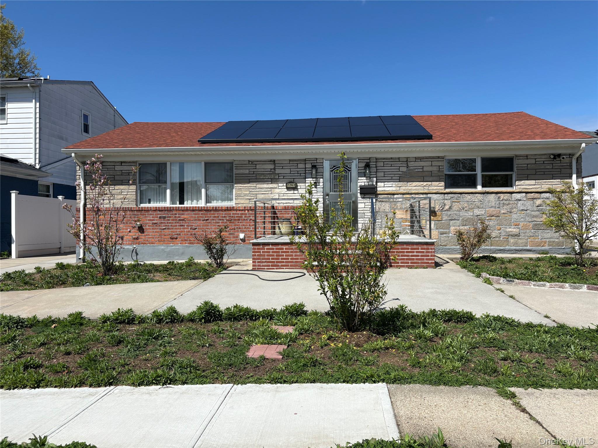front view of house with a yard