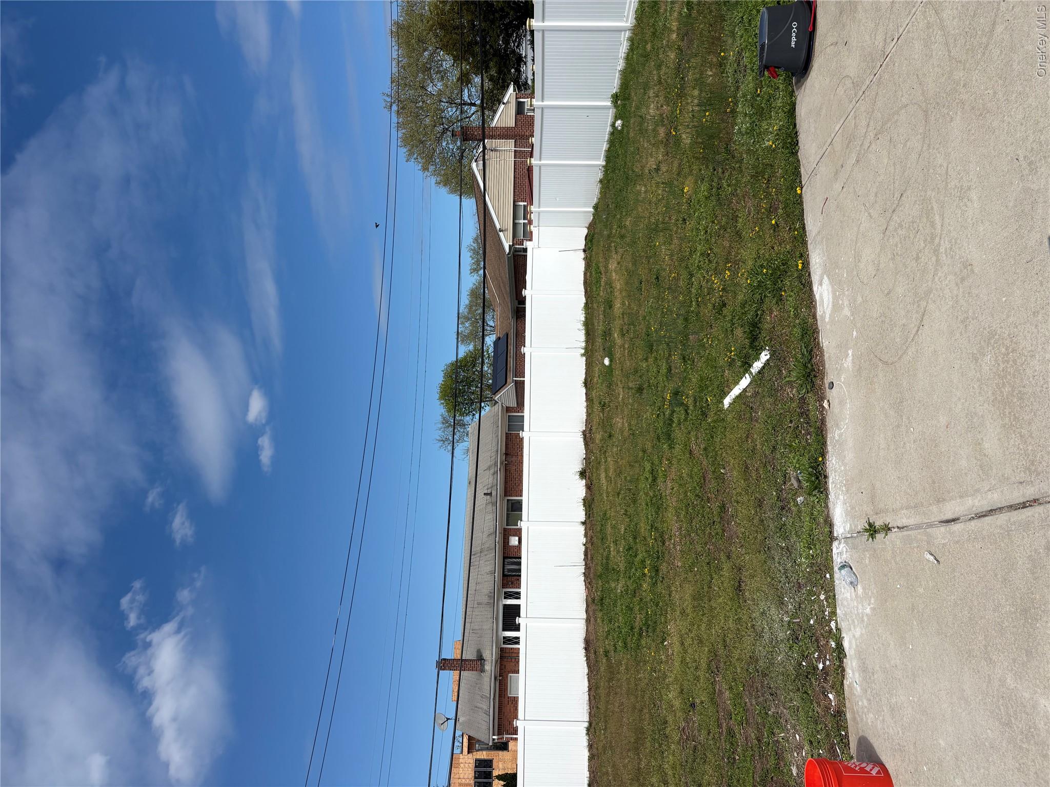 2262 Leighton Road Elmont, NY 11003 - Photo 12 of 12 a view of a swimming pool with an ocean view