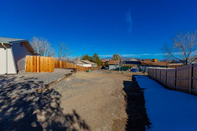 a view of balcony with two chairs