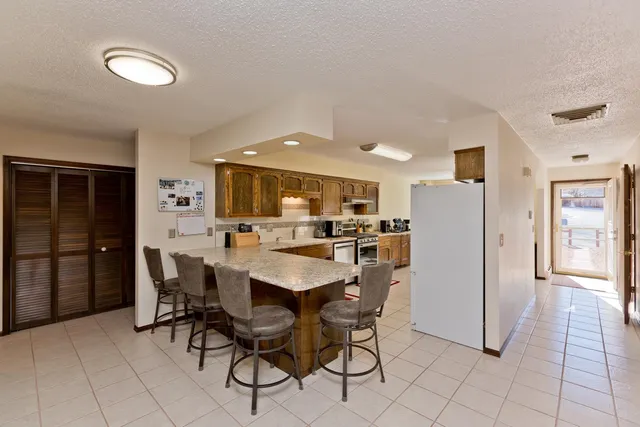a view of a dining room with furniture