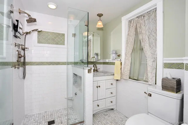a spacious en suite bathroom with a bathtub