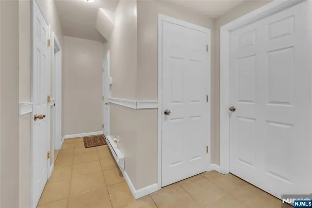 a view of hallway with closet
