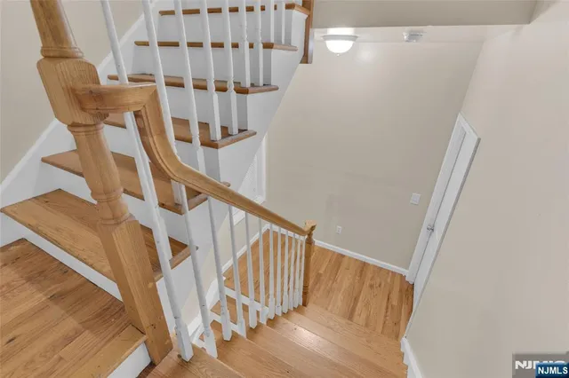 a view of entryway with wooden floor