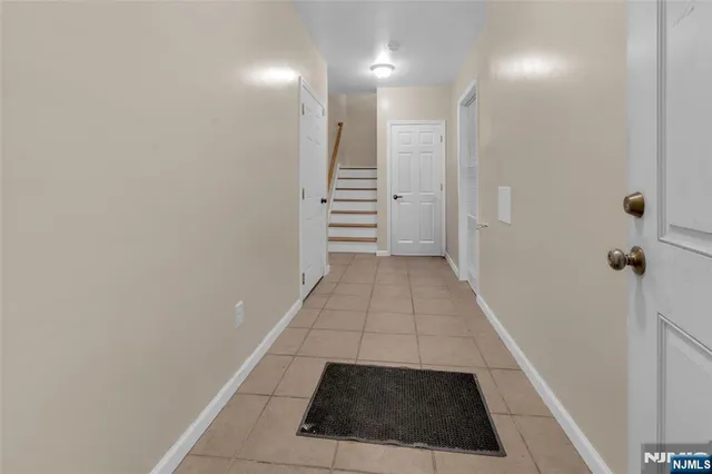 a view of hallway with stairs