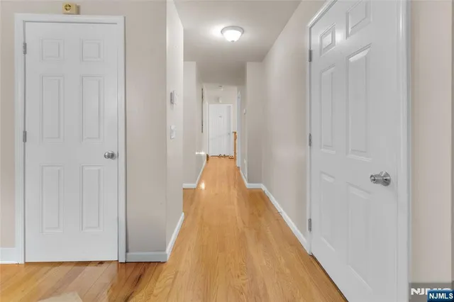 a view of a bathroom with sink and mirror