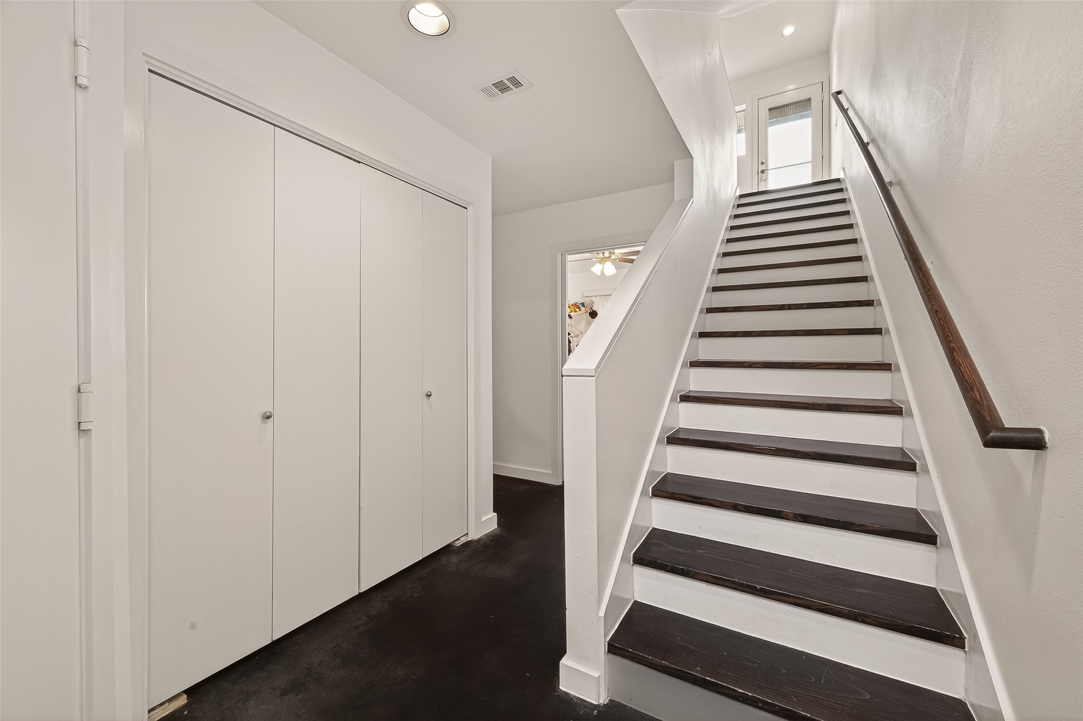 417 Meadow Street Houston, TX 77020 - Photo 6 of 35 a view of an entryway with staircase