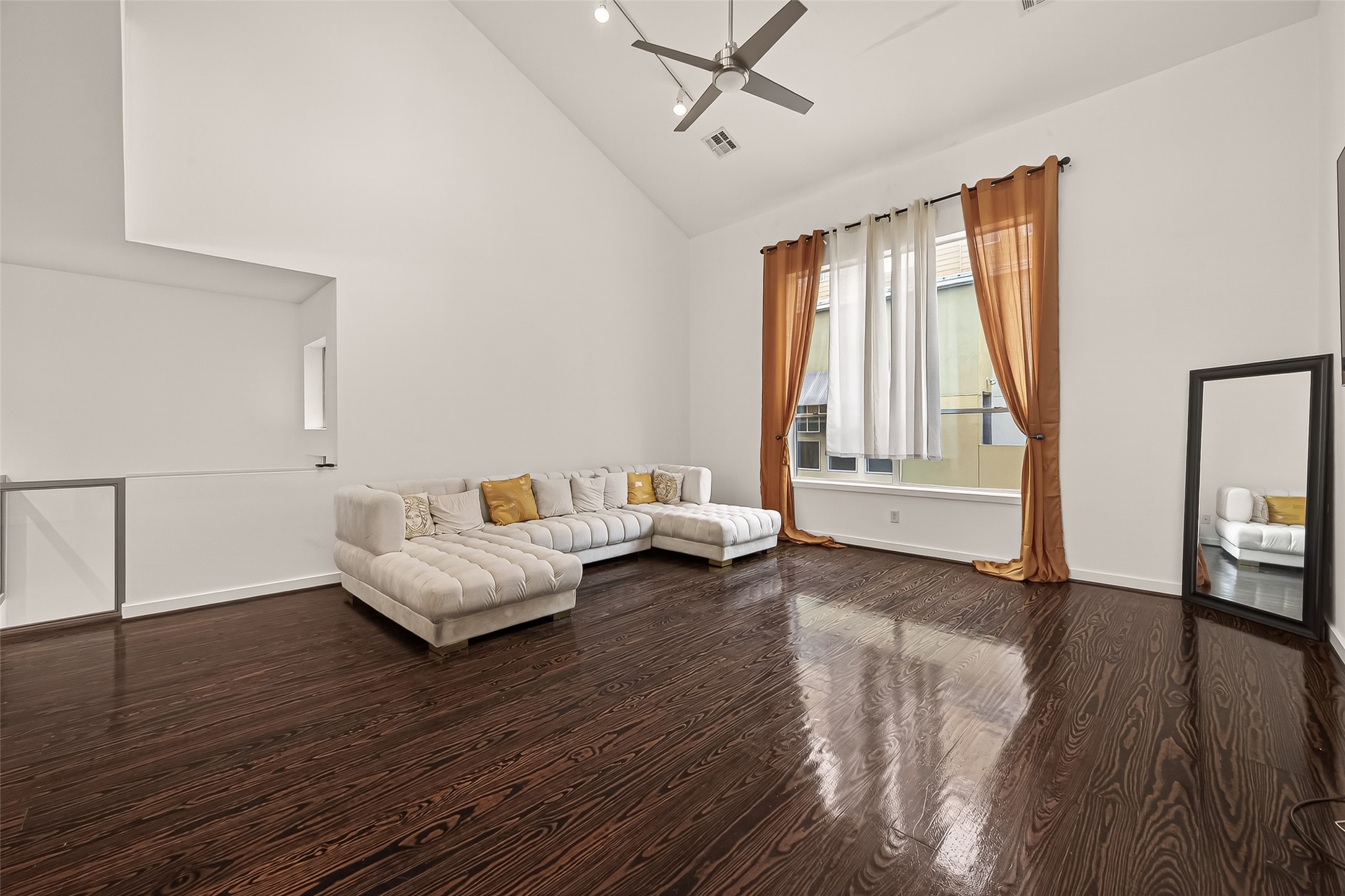 417 Meadow Street Houston, TX 77020 - Photo 7 of 35 a living room with furniture and wooden floor