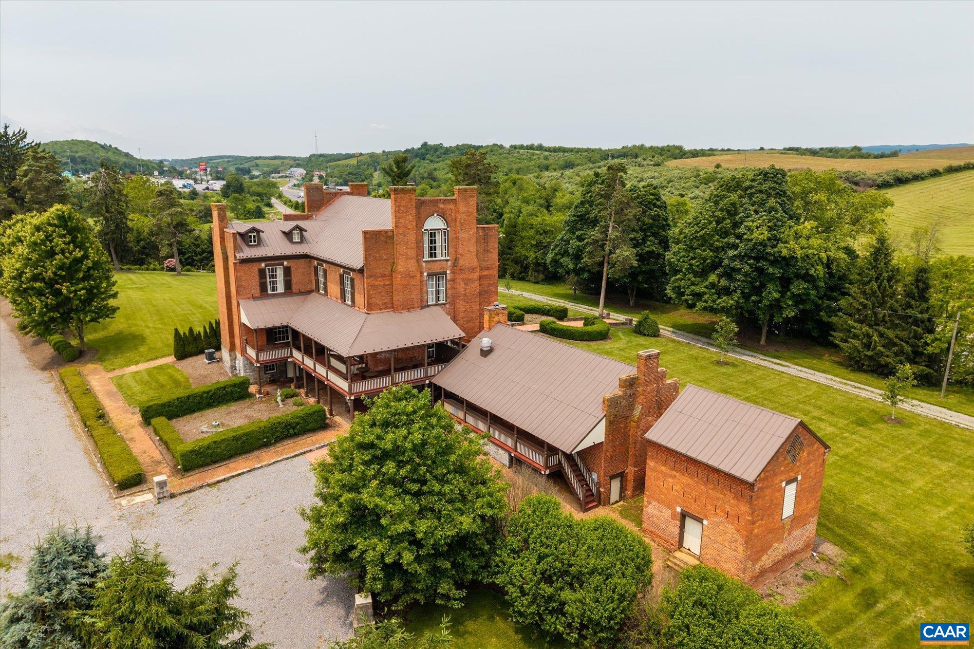 325 Factory Outlet Drive Max Meadows, VA 24360 - Photo 2 of 67 an aerial view of a house with pool garden and outdoor seating