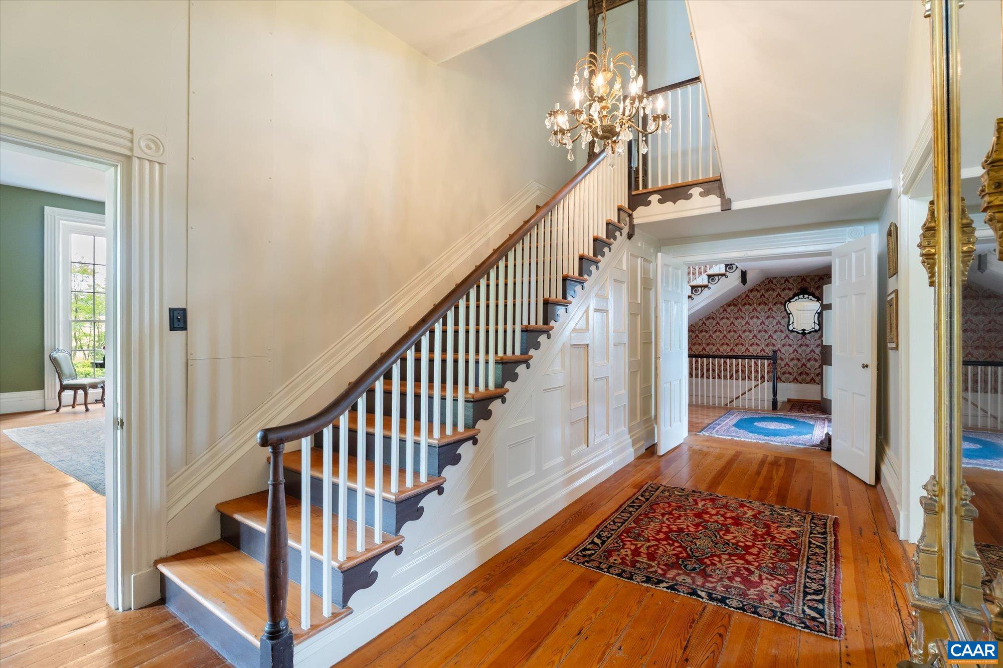 325 Factory Outlet Drive Max Meadows, VA 24360 - Photo 21 of 67 a view of a hallway with wooden floor and staircase