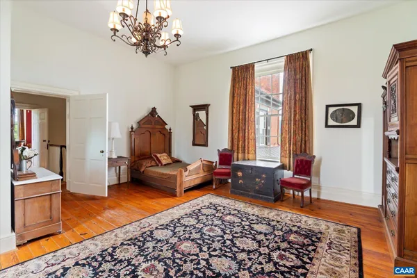 a very nice looking living room with furniture and wooden floor