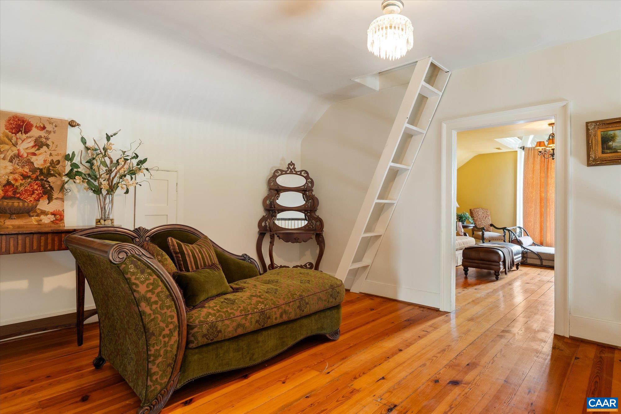 325 Factory Outlet Drive Max Meadows, VA 24360 - Photo 35 of 67 a living room with furniture and a wooden floor