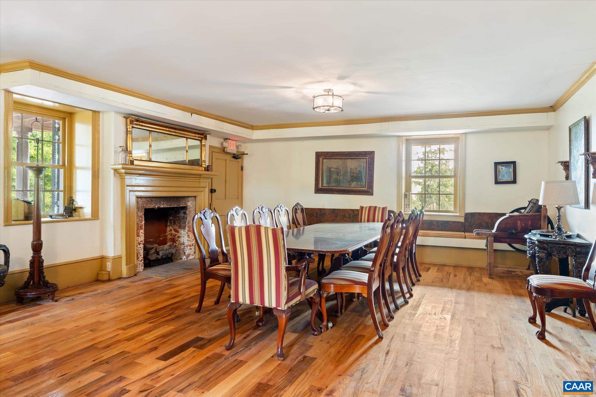 325 Factory Outlet Drive Max Meadows, VA 24360 - Photo 43 of 67 a dining room with furniture a fireplace and wooden floor