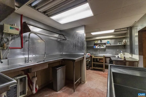 a view of swimming pool with chairs