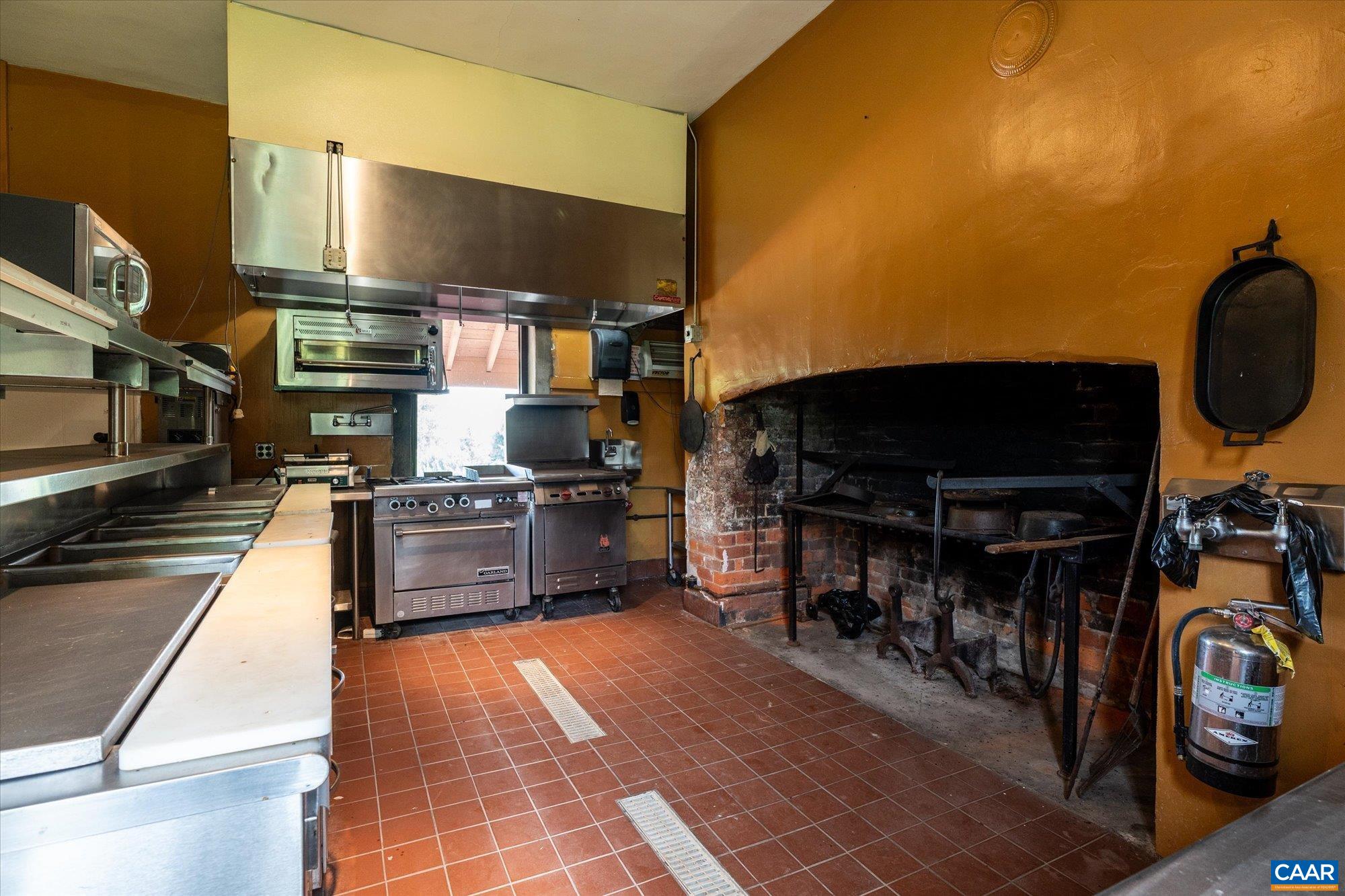 325 Factory Outlet Drive Max Meadows, VA 24360 - Photo 46 of 67 a kitchen with stainless steel appliances a stove a sink and a refrigerator