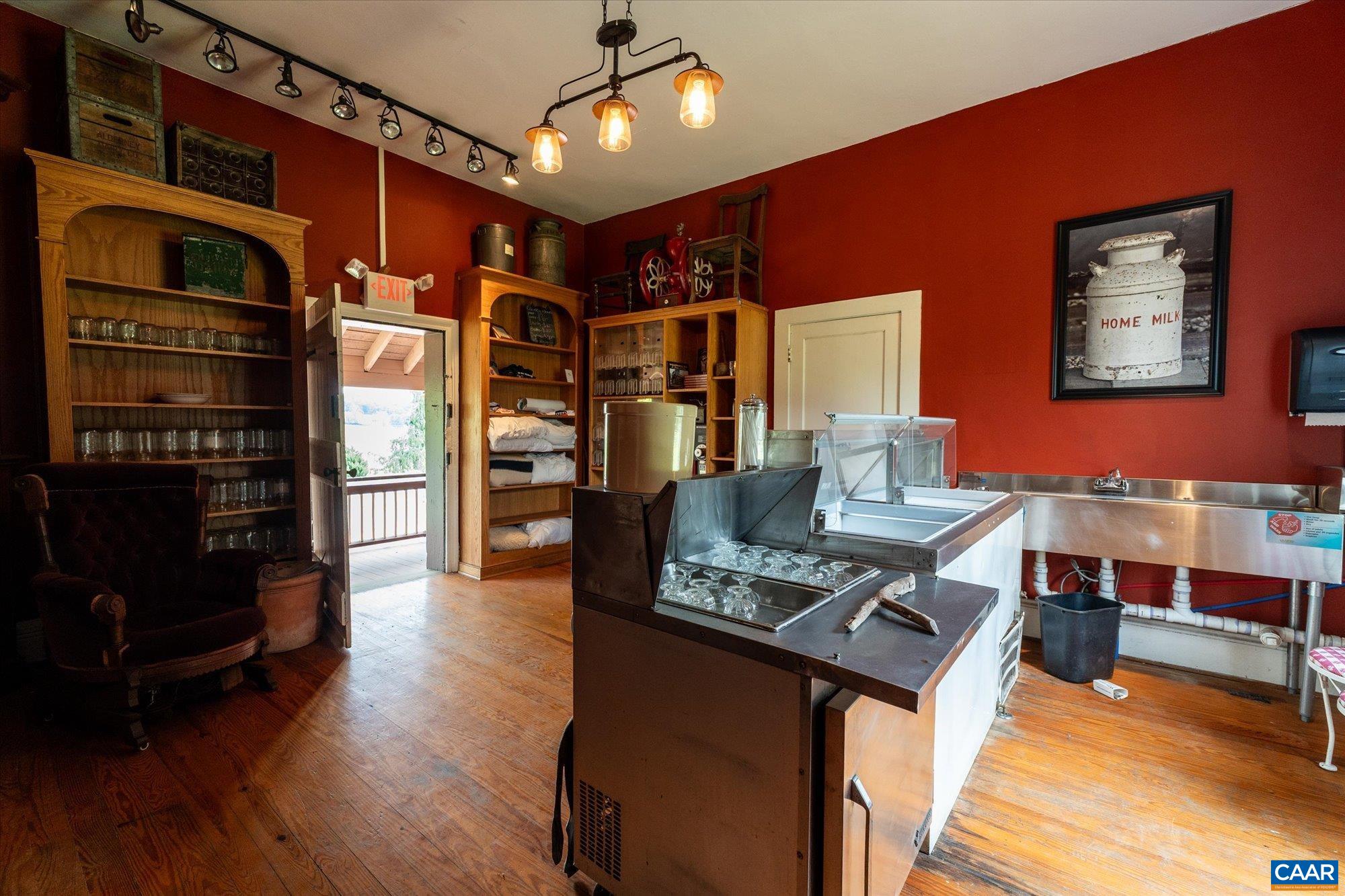 325 Factory Outlet Drive Max Meadows, VA 24360 - Photo 49 of 67 a living room with furniture and wooden floor