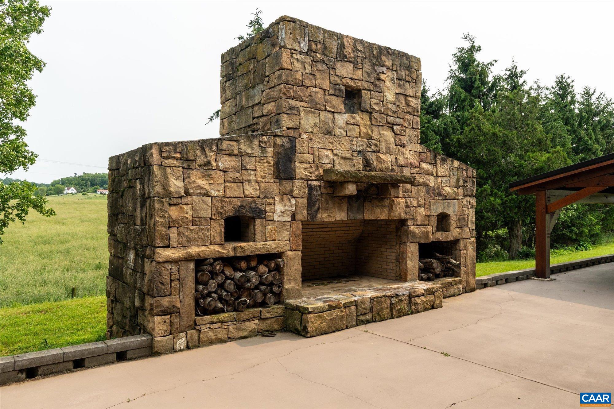 325 Factory Outlet Drive Max Meadows, VA 24360 - Photo 58 of 67 a building with trees in front of it