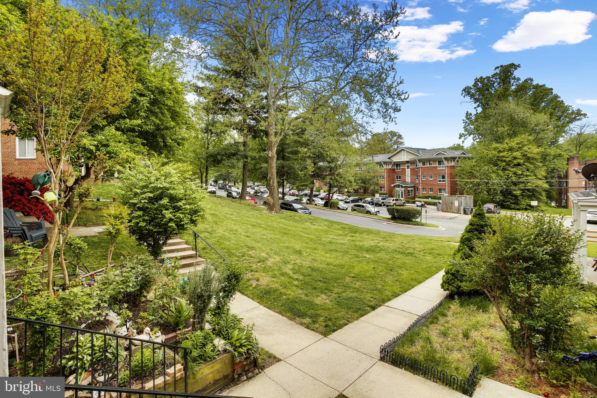 9051 Manchester Road Silver Spring, MD 20901 - Photo 2 of 37 a view of a garden with houses
