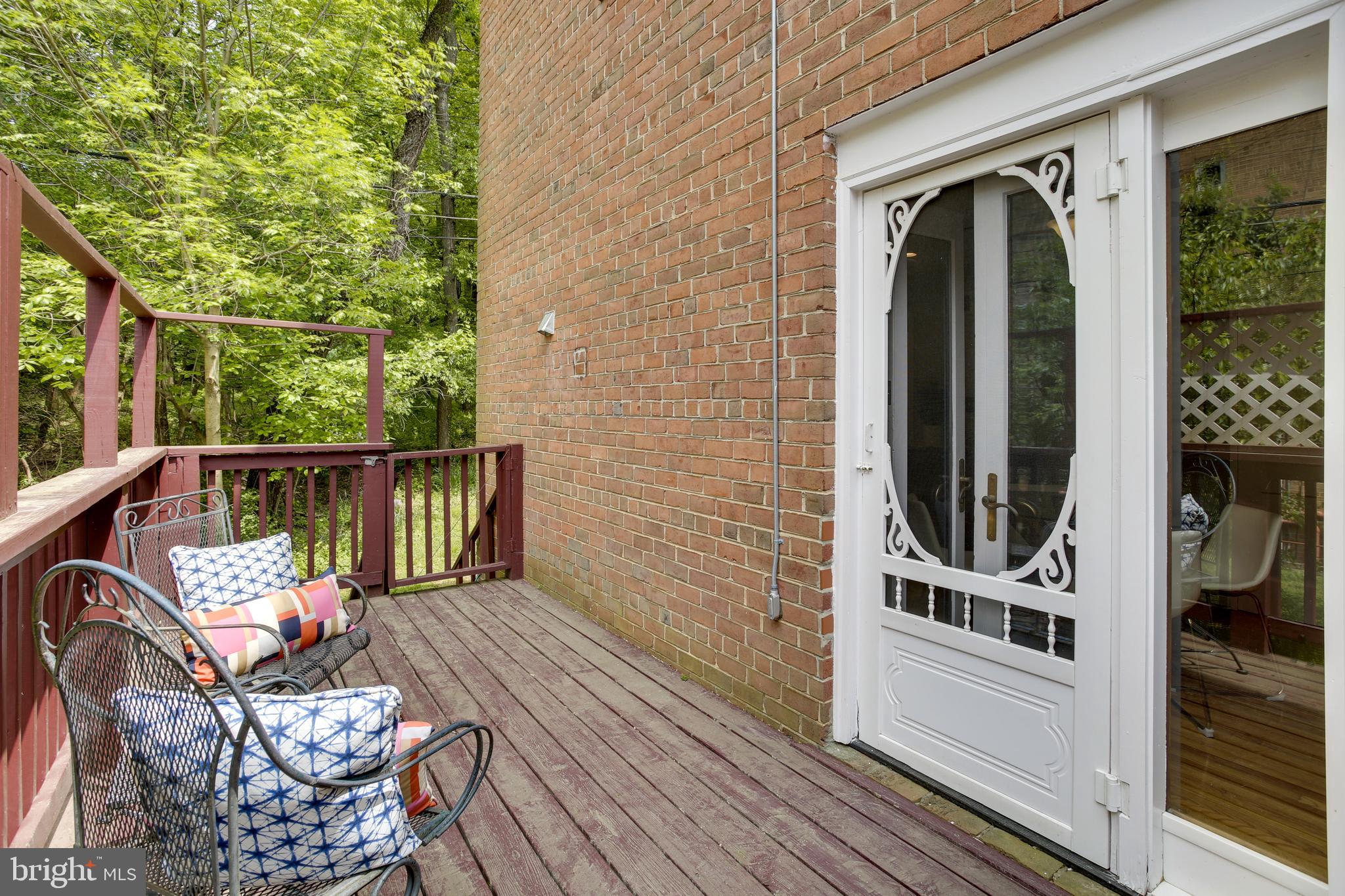 9051 Manchester Road Silver Spring, MD 20901 - Photo 14 of 37 a view of a balcony with chairs
