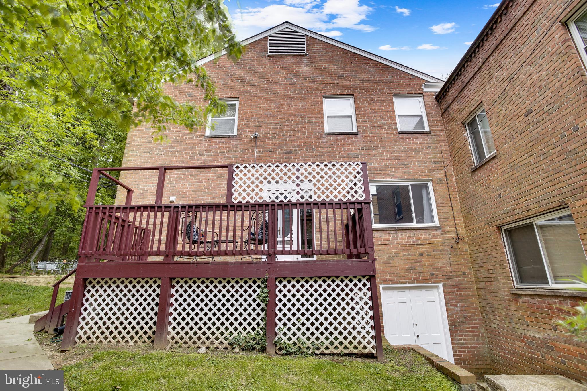 9051 Manchester Road Silver Spring, MD 20901 - Photo 16 of 37 a view of a brick house with many windows