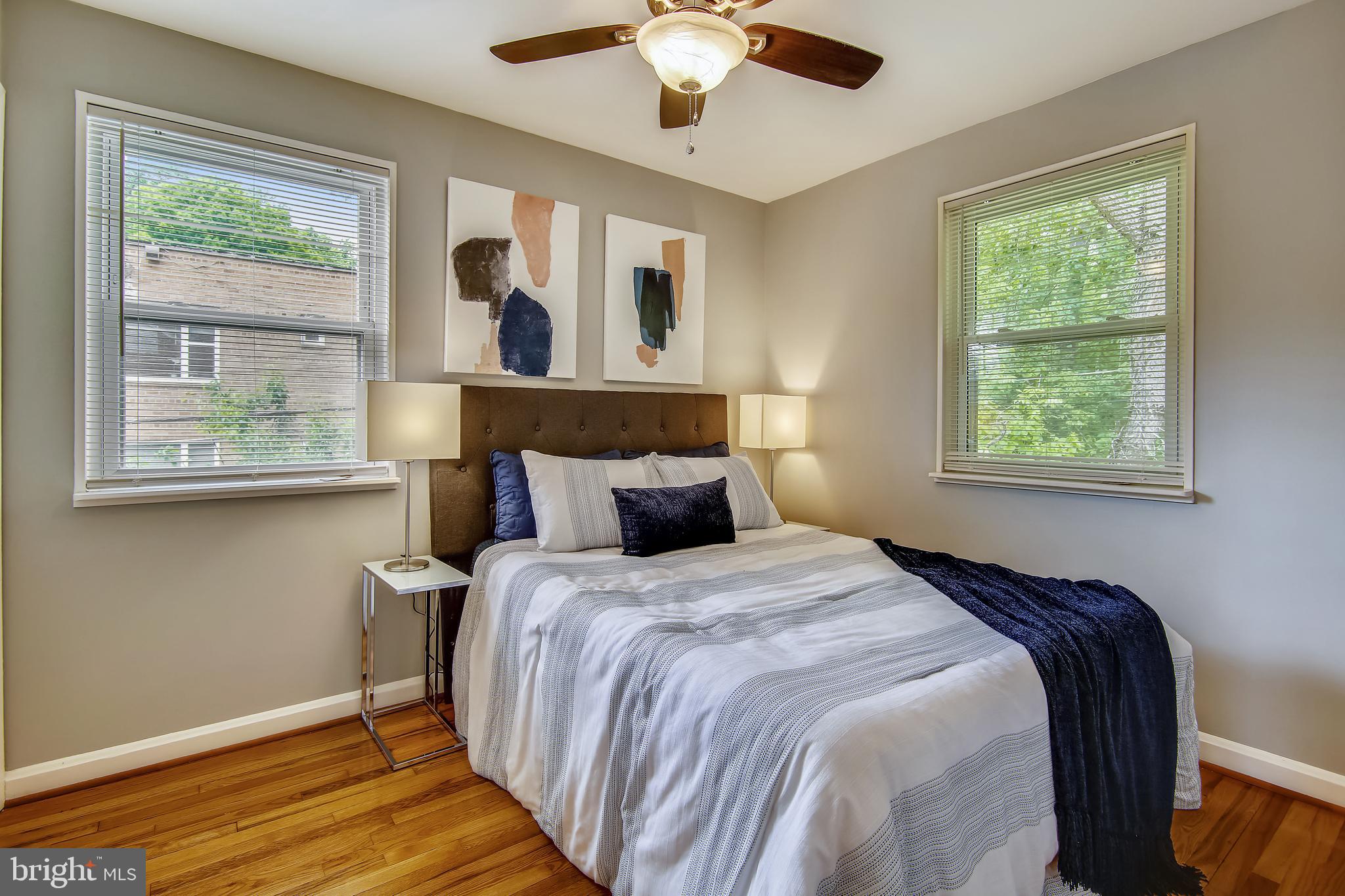 9051 Manchester Road Silver Spring, MD 20901 - Photo 22 of 37 a bedroom with bed and a window