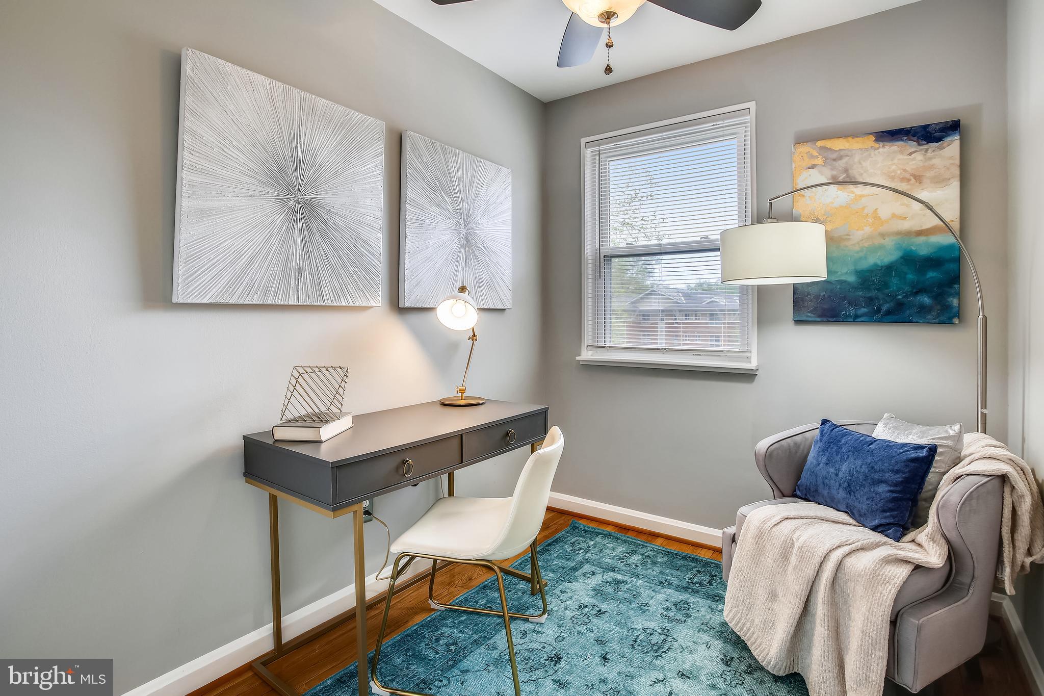 9051 Manchester Road Silver Spring, MD 20901 - Photo 26 of 37 a living room with furniture and a window