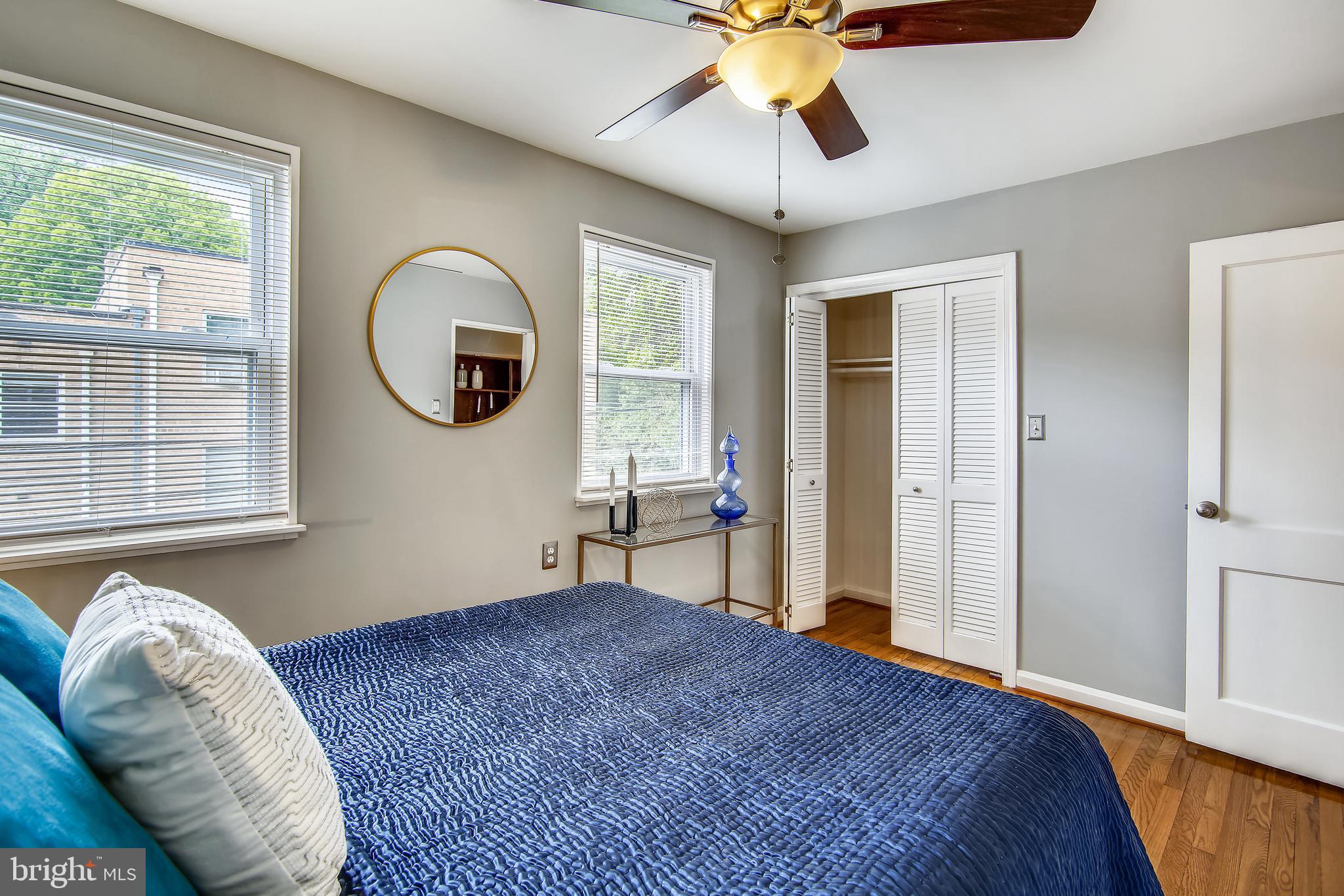 9051 Manchester Road Silver Spring, MD 20901 - Photo 29 of 37 a bedroom with a bed and a window