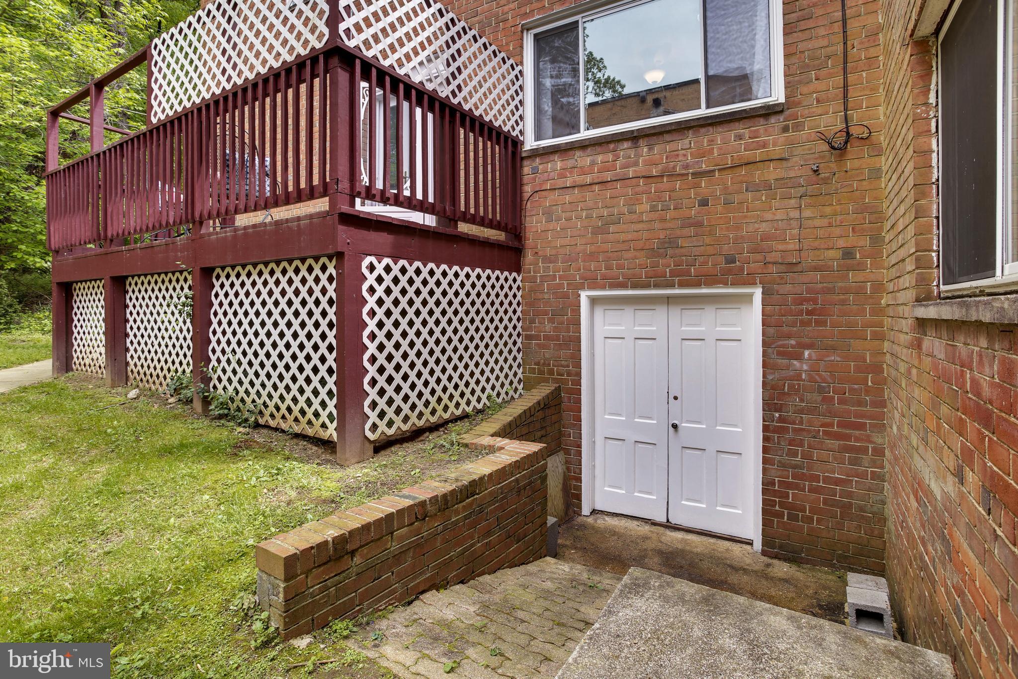 9051 Manchester Road Silver Spring, MD 20901 - Photo 30 of 37 a view of a house with wooden fence