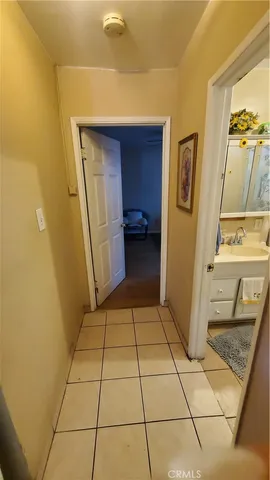 a bathroom with a sink a toilet and a shower