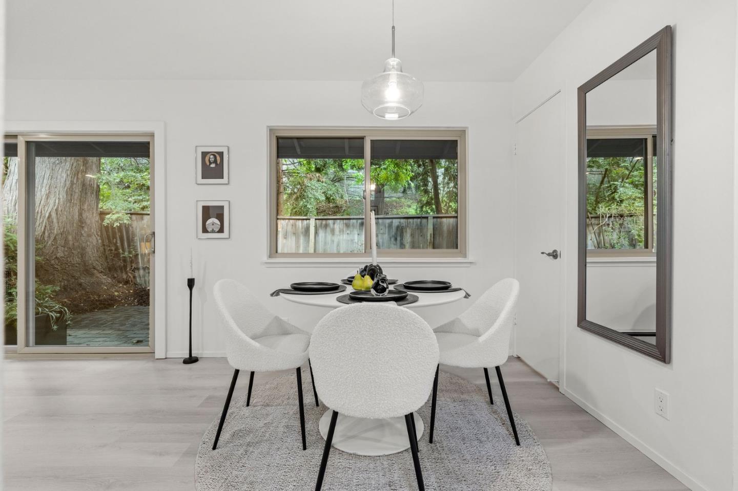 500 West Middlefield Road, Unit 101 Mountain View, CA 94043 - Photo 11 of 37 a view of a dining room with furniture window and outside view