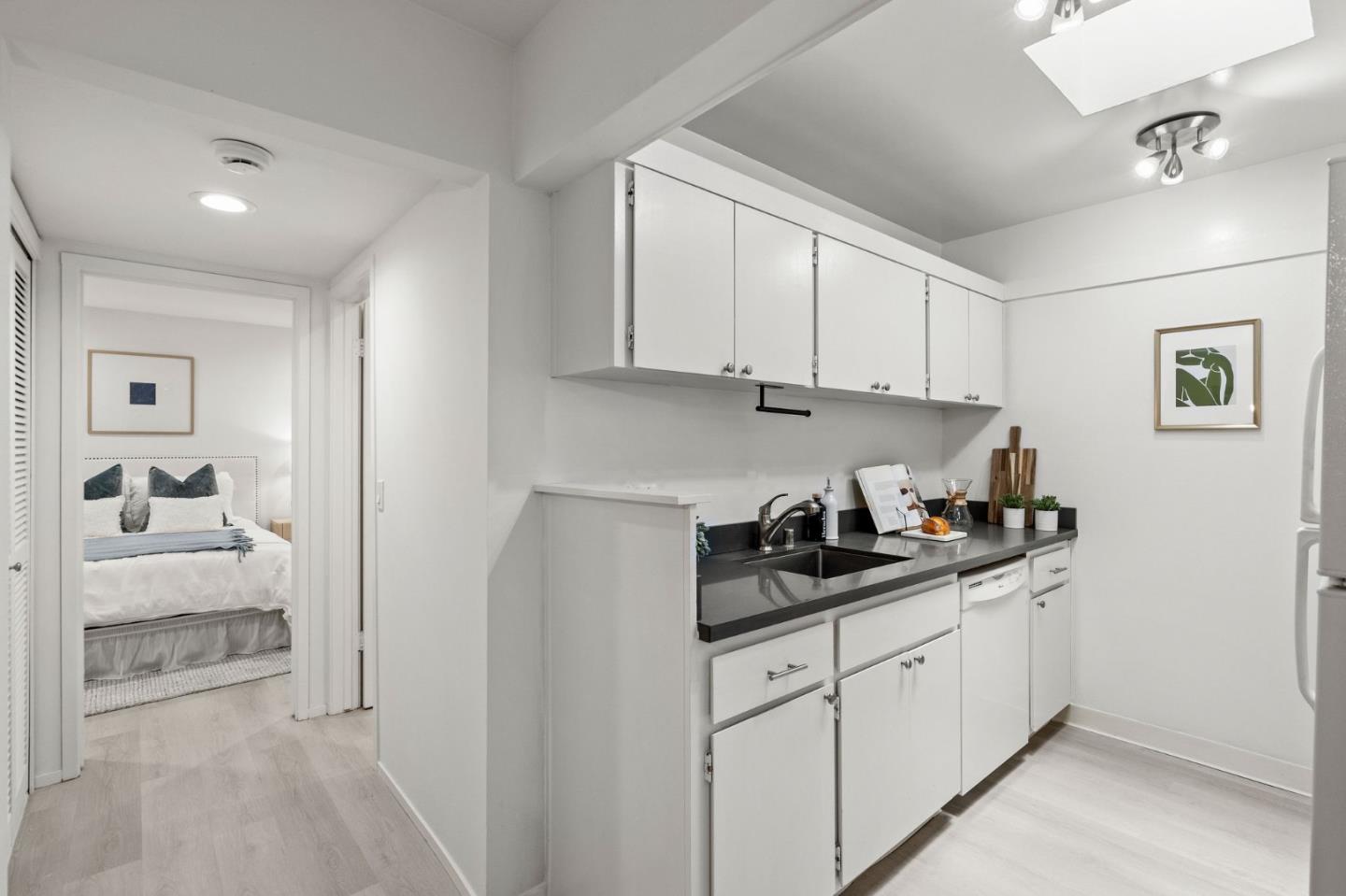500 West Middlefield Road, Unit 101 Mountain View, CA 94043 - Photo 13 of 37 a kitchen with a sink and cabinets